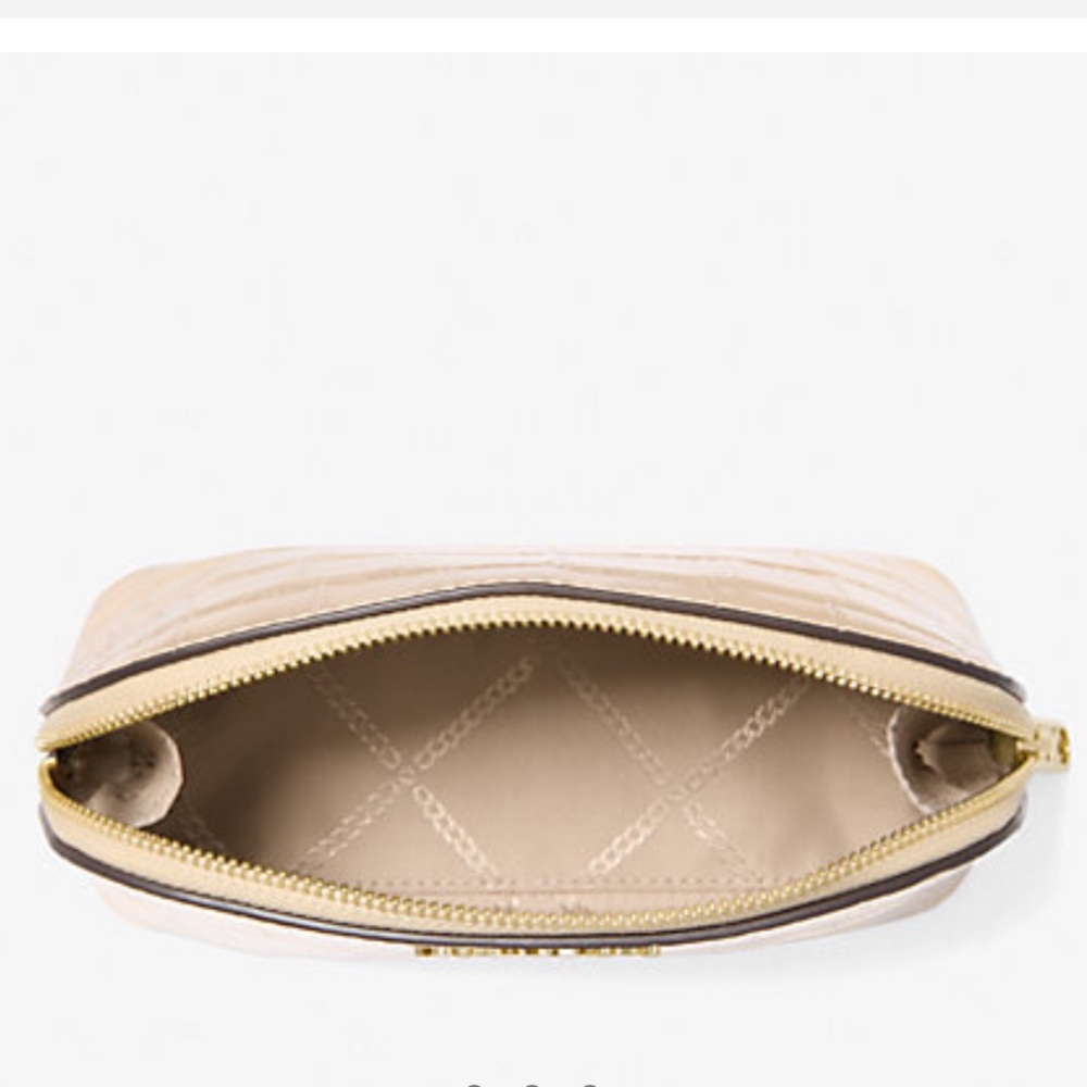 Michael Kors Empire Small Metallic Crocodile Embossed Leather Travel Pouch
Pale - Picture 2 of 2